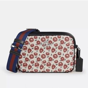 COACH Jamie Camera Bag in
Chalk Multi with a Floral Print.